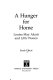 A hunger for home : Louisa May Alcott and Little women /